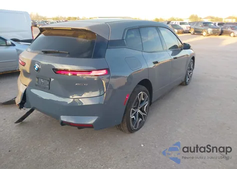 2026 BMW Ix xDrive45 из США, поврежденный, VIN WB543CF01TCW65392